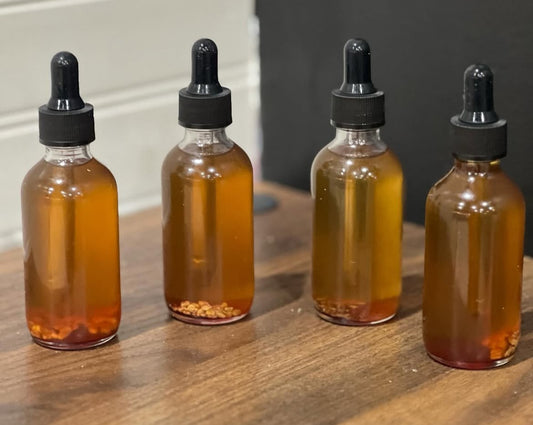 Herb infused hair growth oil